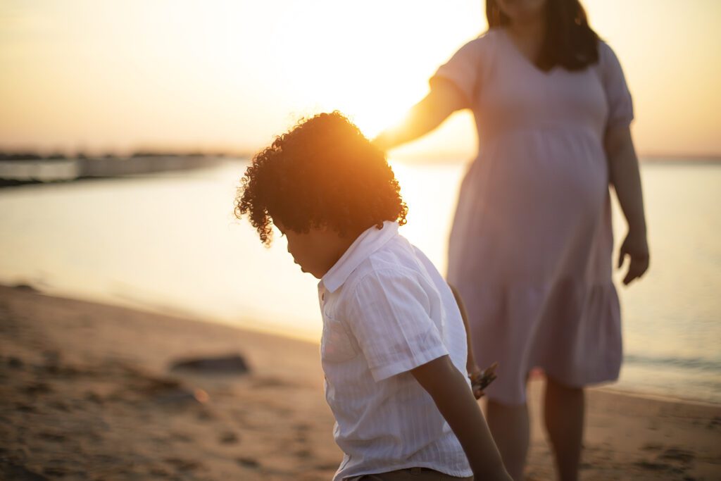 mom and son on a maryland beach during family photo session
