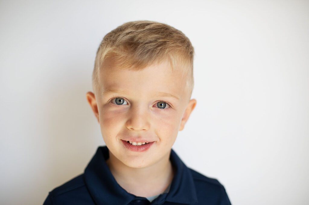 boy smiling during annapolis school photo day