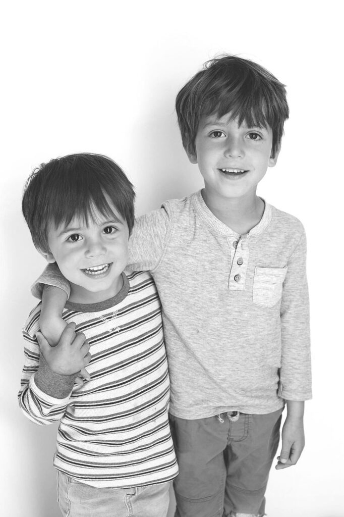 preschooler brothers smiling during annapolis school picture day