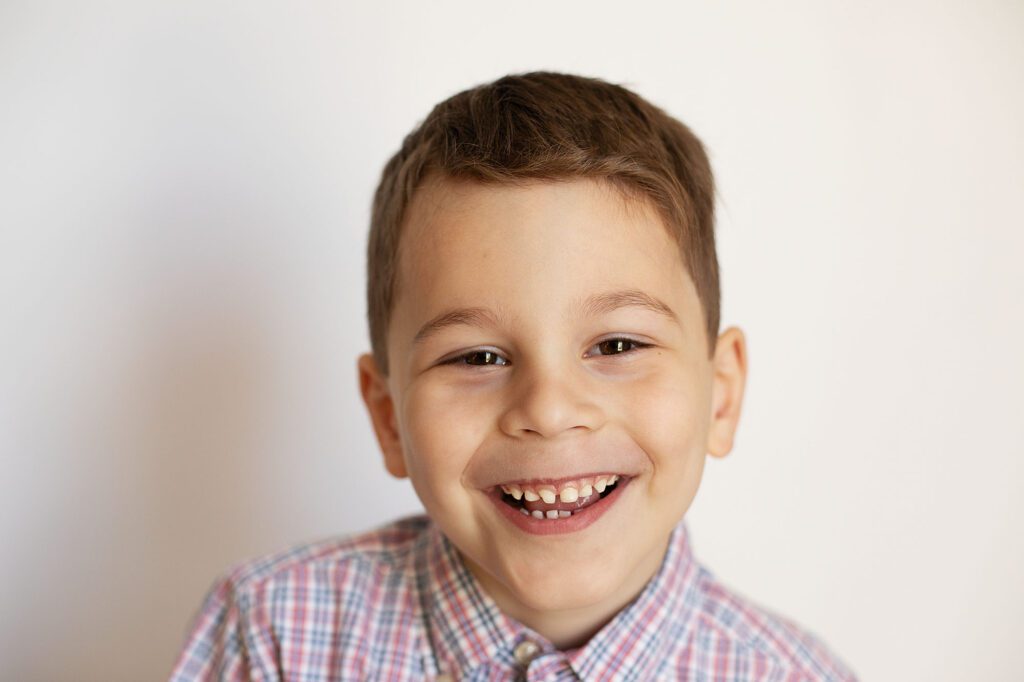 boy laughing during school picture day in columbia md