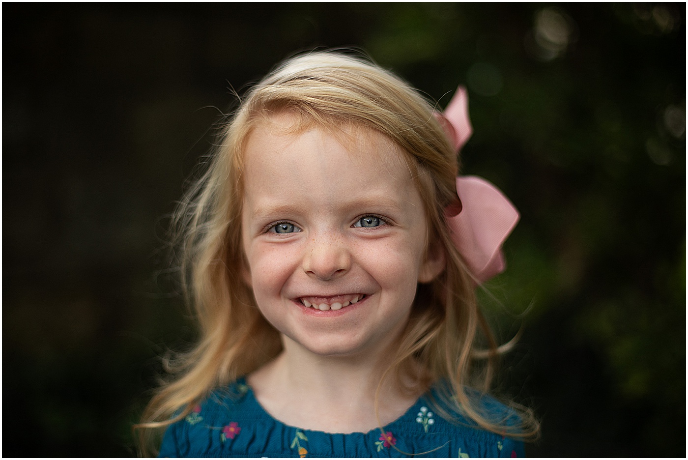 pre k student smiling during school portraits
