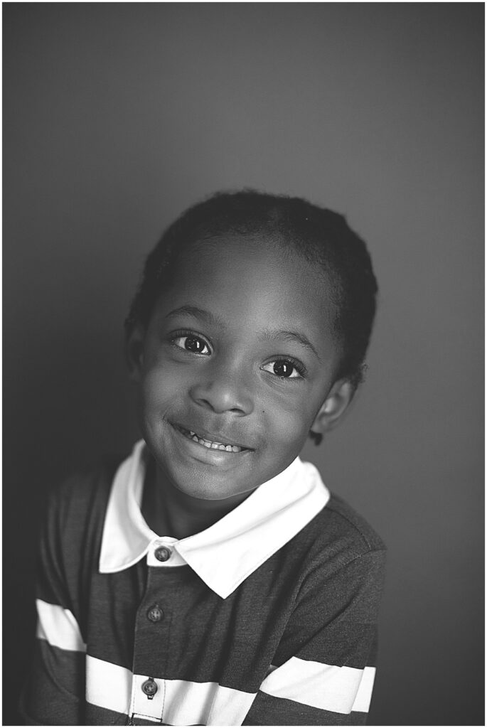 preschool student smiling during picture day baltimore school
