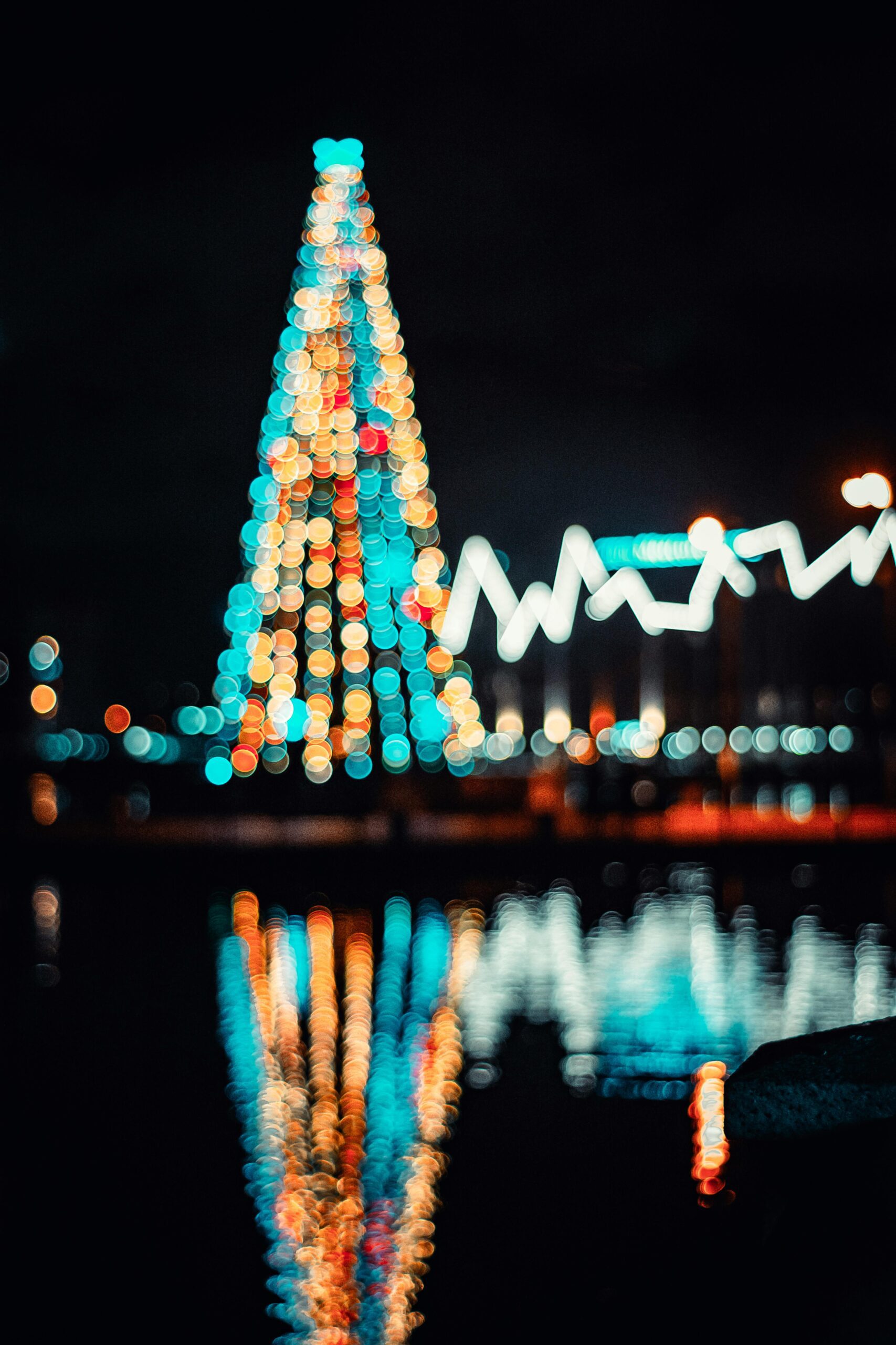 christmas lights glowing along inner harbor