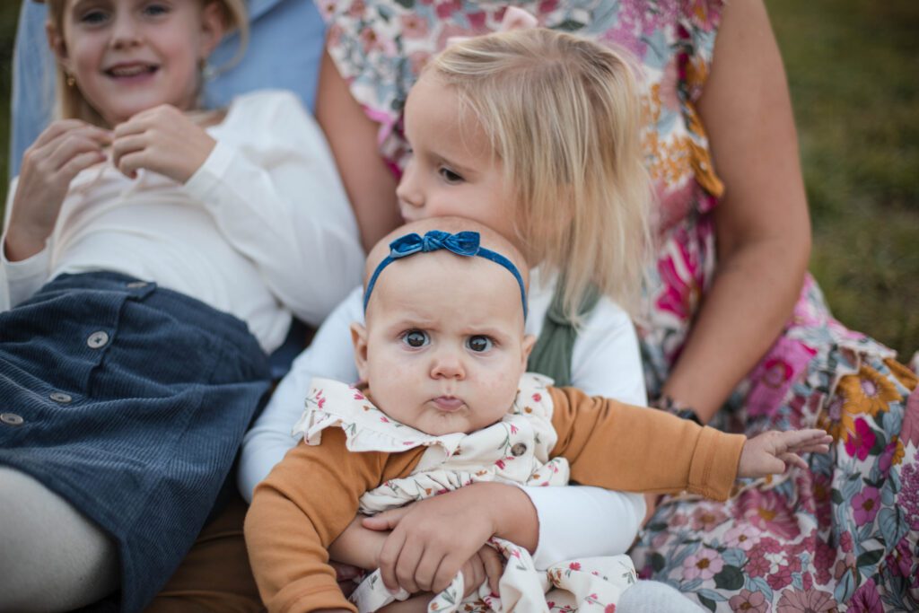 Baltimore Family Photography Superlatives baby girl looking at camera with judgey eyes