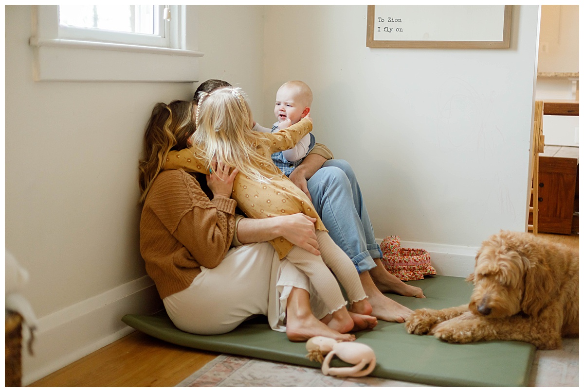 family hugging during baltimore in home family photos