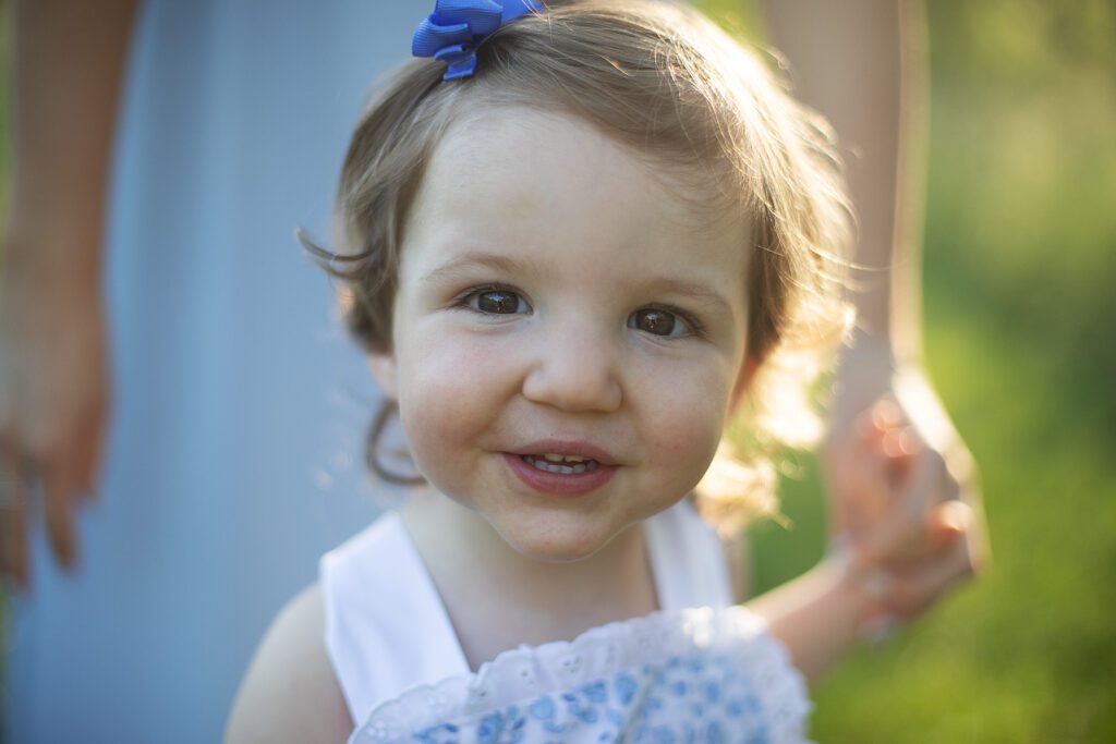 toddler girl smiling during baltimore photo session